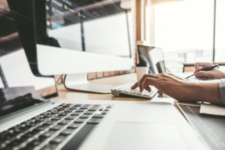 Developing programmer Development Website design and coding technologies working in software company office Developing programmer Development Website design and coding technologies working in software company office